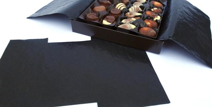 Black cristal paper in a chocolate box