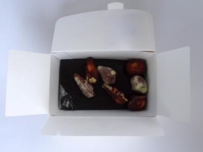 White cristal paper in a chocolate box