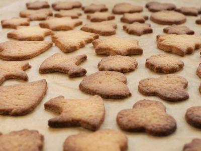 Brown baking paper with cookies on top