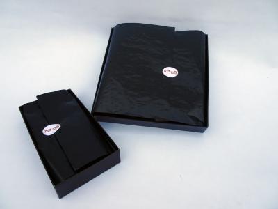 Black cristal paper in a chocolate box