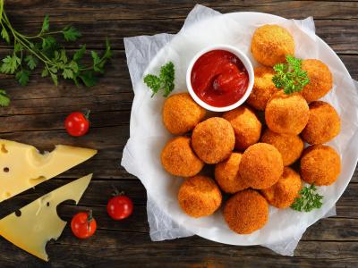 Greaseproof paper underneath croquettes